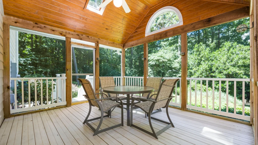 Wooden Porch in a Forest with a Garden Table and Chairs