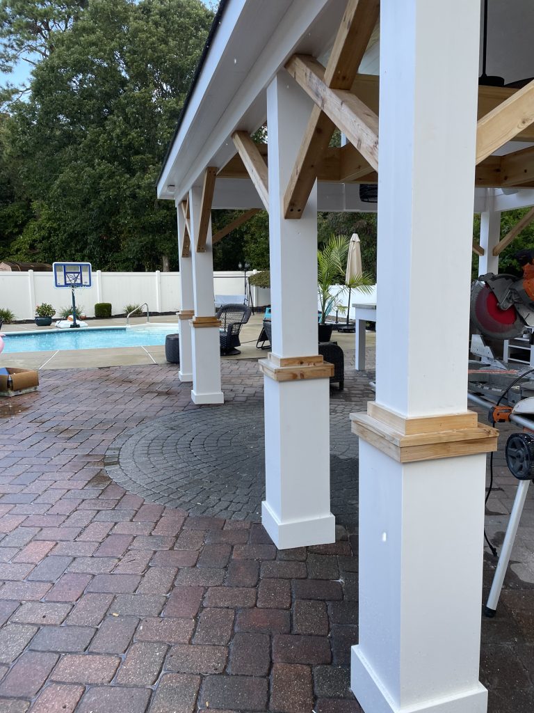 White Columns with wood accents